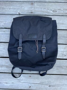 Filson Black Canvas Buckle Backpack
